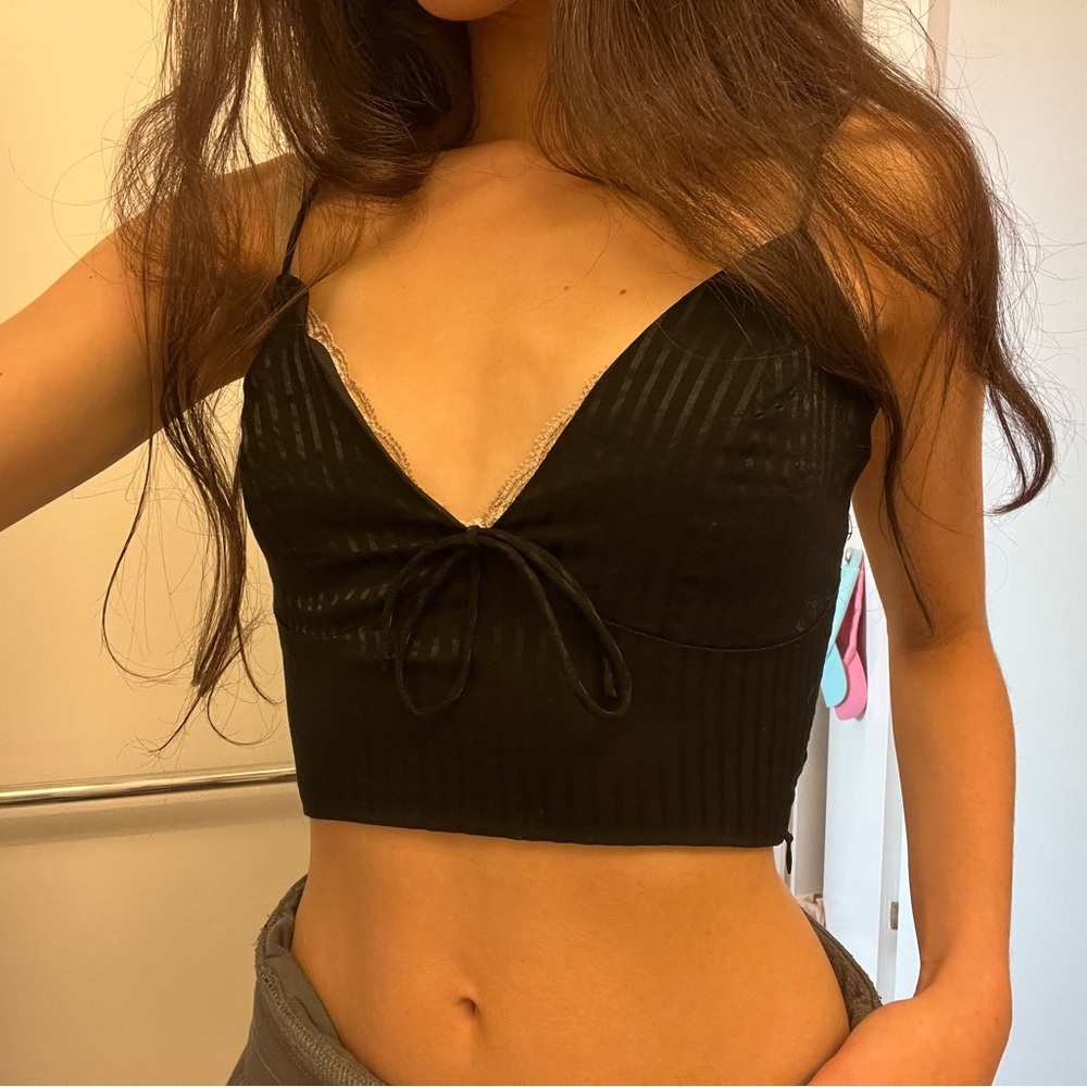Adorable superdown crop top with black on black strips and bow in the middle